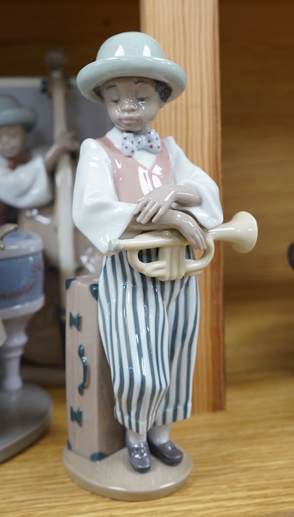 A Lladro group of six ‘Jazz Band’ figures, tallest 25cm. Condition - good